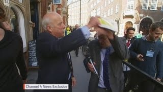 UKIPs Godfrey Bloom hits reporter Michael Crick with party brochure [upl. by Jule111]