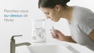 Apprenez à utiliser un hydropulseur jet dentaire Waterpik® Ultra Professional WP660 [upl. by Hseham]