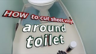 How to cut sheet vinyl around toilet [upl. by Annehsat410]