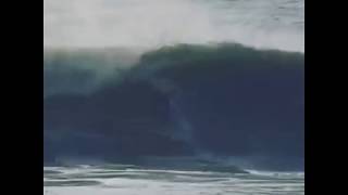 Foil Surfer Almost Barreled at Nazaré [upl. by Kcirdneked]