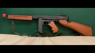 Cybergun Auto Ordnance Licensed Thompson M1A1 Airsoft AEG Rifle Review [upl. by Ellimaj]