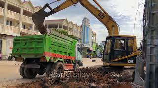 Excavator cat 310 loading land on the truck [upl. by Capon117]