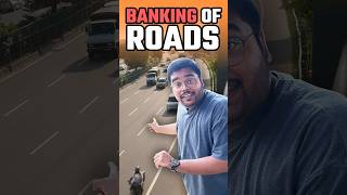 Banking Of Roads Explained 🛣️ shorts road safety informative hindi curious physics cars24 [upl. by Nimzaj]