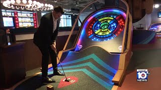 Puttshack brings hightech indoor mini golf to Miami [upl. by Ieluuk]