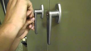 Picking the lock on a file cabinet with a bobby pin [upl. by Elehcor]