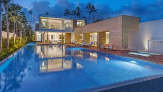 AwardWinning Kahala Oceanfront Estate Tour A Modern Beach Surf Retreat [upl. by Oiramd]