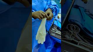 How do Surgeons put their gloves on🤯 shorts [upl. by Yelrebmyk]