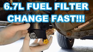 FORD 67L FUEL FILTER CHANGE FAST 20112016 F350 Powerstroke how to change fuel filters reset [upl. by Sivolc224]