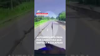 Automovilista pasa por carretera que empieza a colapsar  N [upl. by Ellehsram289]