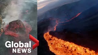 La Palma volcano Drone sweeps over sizzling lava stream huge molten boulder slides down side [upl. by Melliw]