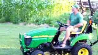 John Deere 2305 How It Cuts Grass [upl. by Esinehc]