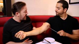 Ricky Gervais Sees Pierced Arm Real or Magic  David Blaine [upl. by Nodaj]