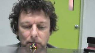 Michel Gondry Solves a Rubiks Cube with his Nose [upl. by Aekin]