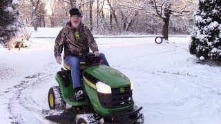 Mowing Snow with a John Deere D105 [upl. by Eal]