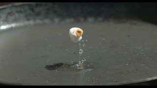 Popping Popcorn in super Slow Motion  The Slow Mo Guys [upl. by Corvin]