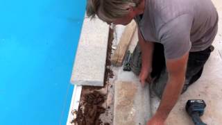 Hugh Fitting Coping Stones To A Swimming Pool Refurbishment [upl. by Aivonas]