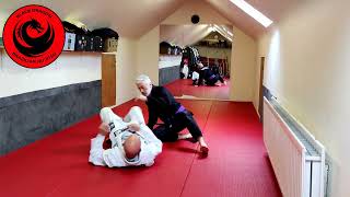 John Danaghers  Half Guard Reverse Crossface  Reverse Elbow Escape week 5 [upl. by Paul]