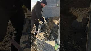 Completing a Blue Stone retaining wall canberra stonemason masonry landscaping [upl. by Blinni69]