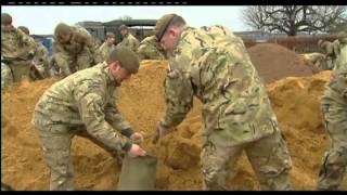 Airmen amp Soldiers Dig Deep to Combat UK Floods 140214 [upl. by Gwenora845]