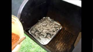 The Landmann Tennessee hot and cold smoker and BBQ used in the Smoky Jo way [upl. by Ynetruoc]