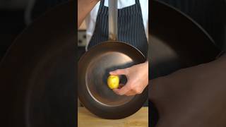 Seasoning a carbon steel pan with a potato kitchenhacks cooking [upl. by Dehlia]