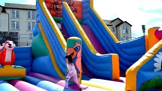 Bouncy Castle Fun for Children at Adventure Park Fun Fair  TheChildhoodLife [upl. by Raseda685]