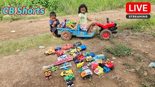 Yana and Oun Mey ride a tractor to find small cars on the road near their house again today [upl. by Oniratac]