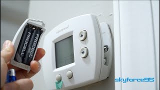 How to Replace the Batteries in a Honeywell Thermostat [upl. by Veronika145]