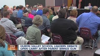 Huron Valley School leaders debate open carry after parent brings gun to school [upl. by Rehtaeh706]