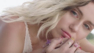 Miley Cyrus  Malibu  lyrics video [upl. by Einoj311]