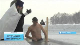 Christian Orthodox Epiphany Believers in Russias Siberia mark Epiphany with icy plunge [upl. by Cath]