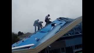 Installing roofing foil as sarking on a metal framed roof [upl. by Elrebmik922]