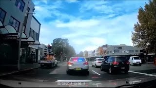 Driver overtakes unmarked police car in left turn only lane  Newcastle NSW [upl. by Pesvoh515]