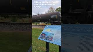 Norfolk Southern Train 14M makes its way by the Gauge War plaque at the quotrailfan parkquot short [upl. by Meagher738]