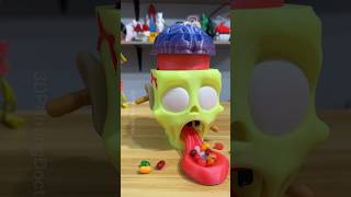 Candy dispensing ZOMBIE head is 3D printed [upl. by Shannan88]