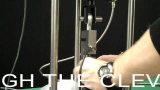 Tension Load Cell Force Calibration Using a Morehouse Universal Calibrating Machine [upl. by Nauwtna241]