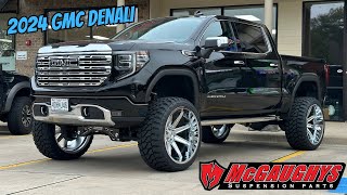 2024 GMC Denali 1500 on a 9” McGaughys lift and 26x14 Axe Artemis wheels [upl. by Jarus]