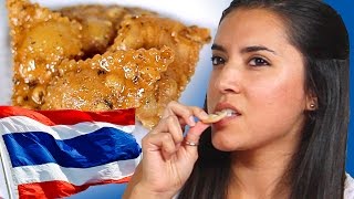 Americans Try Thai Snacks [upl. by Peatroy]