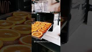 Watch as this bartender transforms fresh oranges into dehydrated slices 🍊✨ Perfect for cocktails [upl. by Arivle]