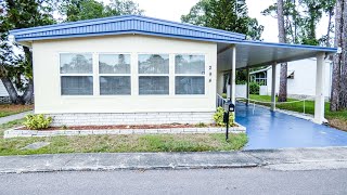 Largo FL Lakefront Community Single Wide Mobile Home For Sale Fully Furnished [upl. by Ardnasirhc]