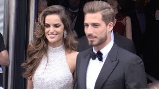 Izabel Goulart and husband Kevin Trapp coming out of the Palais des festival in Cannes [upl. by Antonetta]