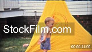 1954 Setting up boy scout tent in backyard as a dry run for real camping AMES IOWA [upl. by Carbo]