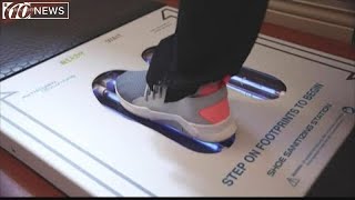 Shoe sanitizing station helps fight bacteria in hospitals [upl. by Schaab]