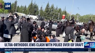 UltraOrthodox Jews riot outside of main IDF drafting center [upl. by Wurtz604]