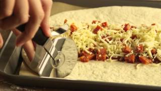 How to Make Calzone  Calzone Recipe  Allrecipescom [upl. by Aleekat31]