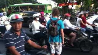 How to cross a street in Ho Chi Minh City Saigon Vietnam [upl. by Ettenad]