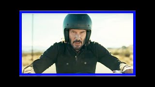 Keanu Reeves Takes LifeRisking Motorcycle Ride in Super Bowl Ad [upl. by Tillion627]