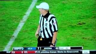 Fake Ref runs on field during UCLA Bruins vs Arizona Wildcats game and fight breaks out [upl. by Amethist]