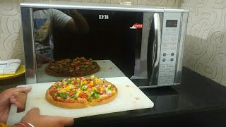 How to make pizza in IFB microwave with convection mode [upl. by Ardnossac484]