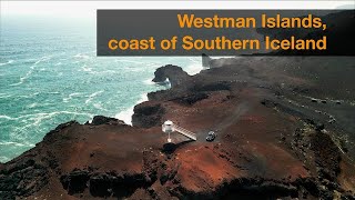 Stunning drone shot of the rugged cliffs of Heimaey Island Iceland [upl. by Rheta483]